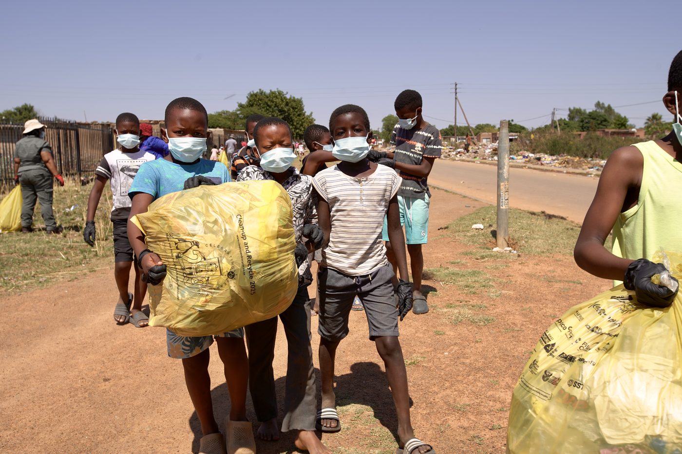 Children and volunteers taking positive action